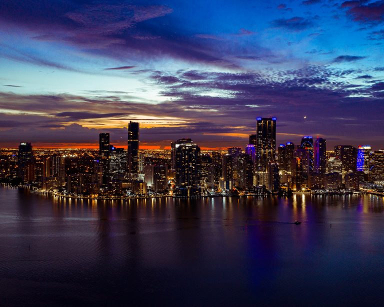 Brickell skyline lit up at blue hour, by Arte City Media