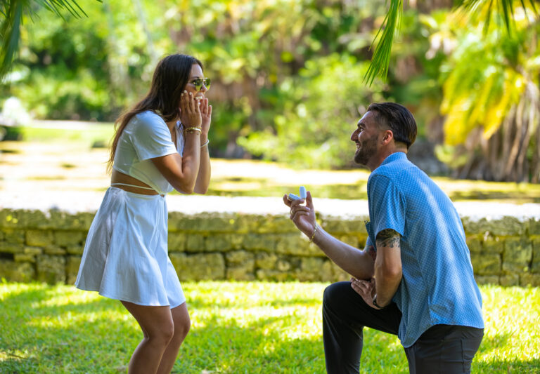 Man proposing to his partner in a park