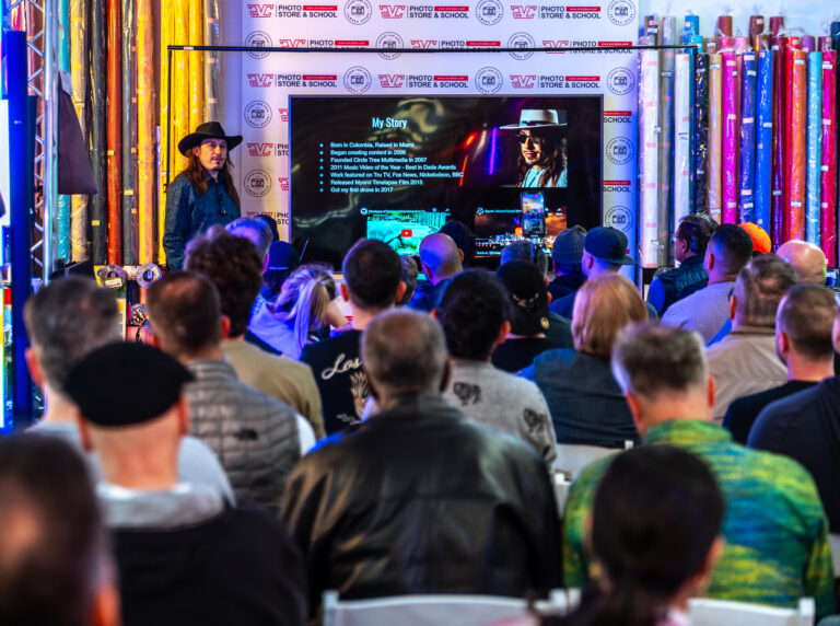 Audience watching a presentation at a corporate event filmed by Arte City Media