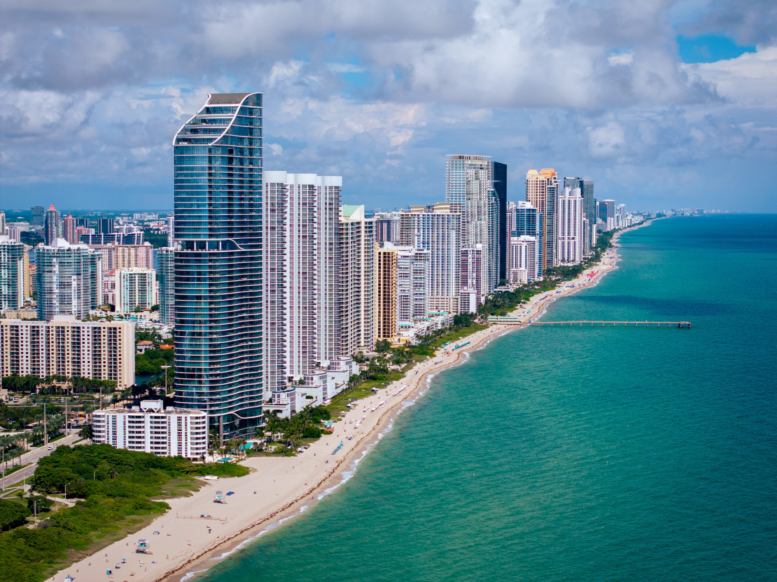 Aerial view of the Sunny Isles Beach skyline and coastline, by Arte City Media